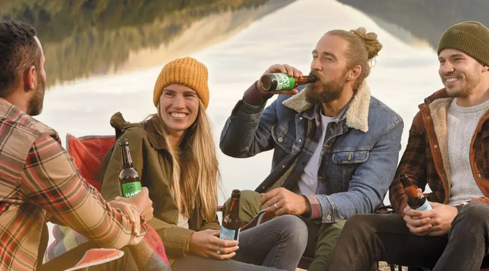 Hawkshead Advert Screenshot Group Drinking Outside