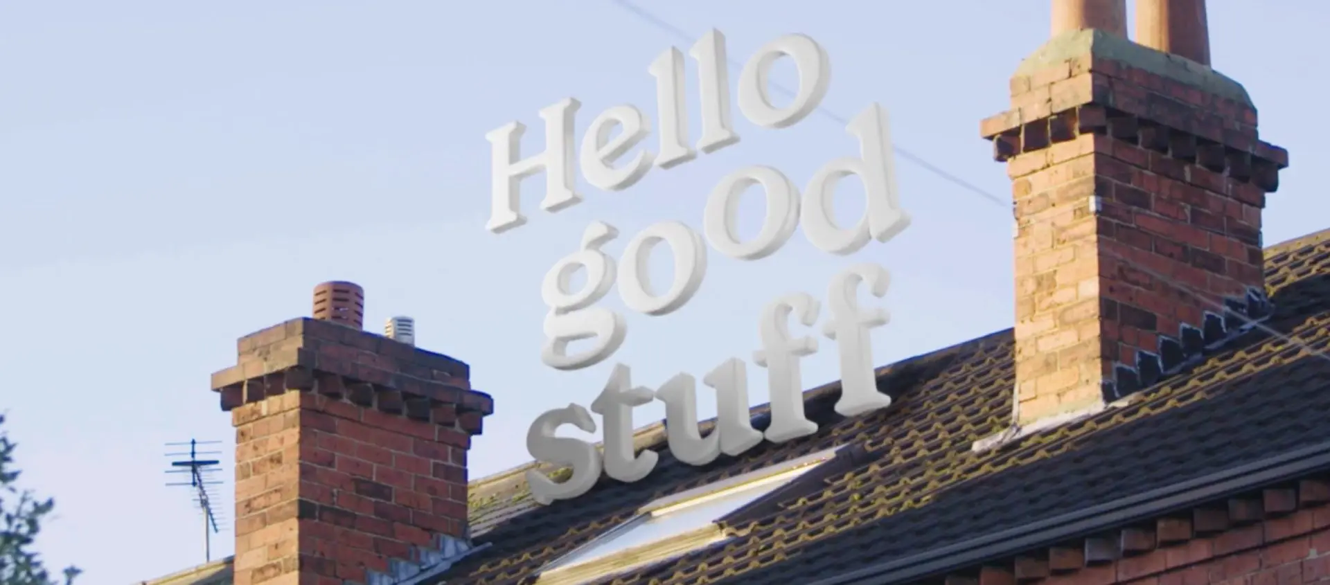 KCOM "Hello Good Stuff" Video screenshot - logo over house
