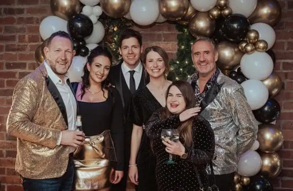 Ponderosa Management team dressed in their best at Christmas Party