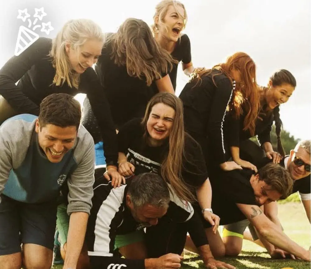 Ponderosa team in human pyramid at away day