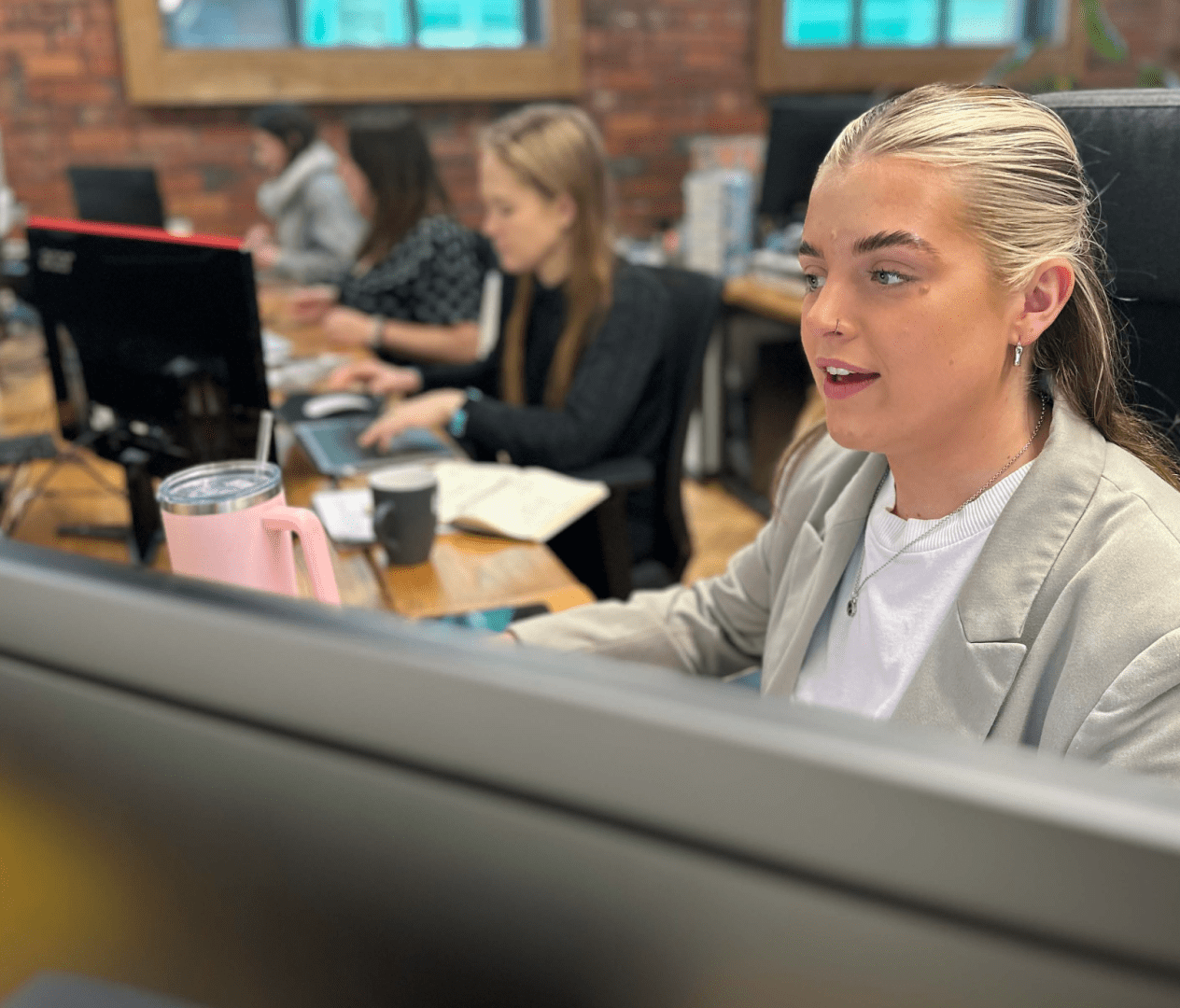 Lily at her desk